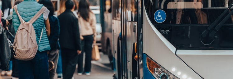 People boarding a public transport bus